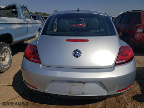 2012 Volkswagen Beetle 2.5L w/Sun PZEV with VIN 3VWJP7AT6CM601557, listed as a Copart auction lot 68744194 with 71,713 mi miles and Salvage Title. Bid and sale history available at carsss.com. Image 6.