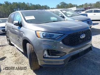 2021 Ford Edge ST z VIN 2FMPK4AP6MBA33709, wystawiony jako IAAI lot #41667444 z przebiegiem 27 173 mil mil oraz . Historia ofert i sprzedaży dostępna na DreamBid. Obrazek 1.