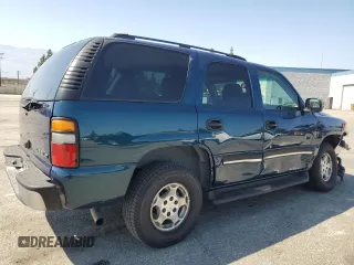 2005 Chevrolet Tahoe LS with VIN 1GNEC13V75R173583, listed as a Copart auction lot 59998015 with 164,575 mi miles and Salvage title. Bid and sale history available at DreamBid. Image 3.