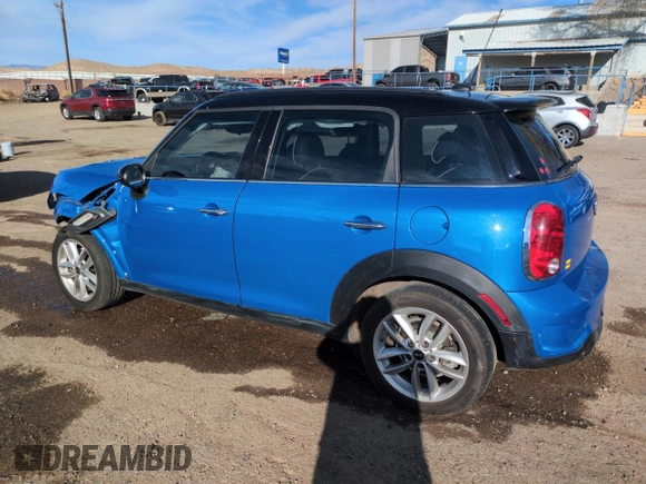 2012 MINI Countryman S with VIN WMWZC3C57CWL80976, listed as a Copart auction lot 50023105 with 74,504 mi miles and Salvage Title. Bid and sale history available at DreamBid. Image 2.