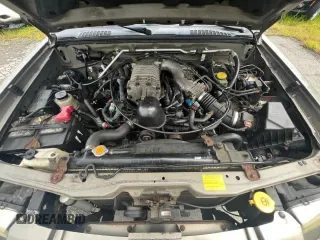 2004 Nissan Frontier SC z VIN 1N6MD29Y24C441110, wystawiony jako Copart lot #75842344 z przebiegiem 119 954 mil mil oraz Czysty tytuł • Clean title. Historia ofert i sprzedaży dostępna na DreamBid. Obrazek 7.