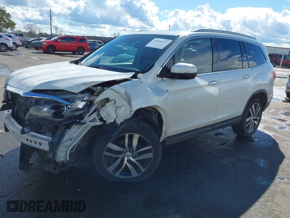 2017 Honda Pilot Elite with VIN 5FNYF6H06HB041609, listed as a IAAI auction lot 41804477 with 134,535 mi miles and . Bid and sale history available at DreamBid. Image 18.