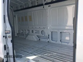 2023 Ford Transit Cargo with VIN 1FTBR3U88PKA07731, listed as a IAAI auction lot 41781986 with 37,044 mi miles and . Bid and sale history available at DreamBid. Image 8.