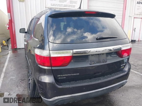 2013 Dodge Durango Crew with VIN 1C4RDJDG3DC675676, listed as a IAAI auction lot 41765289 with 140,626 mi miles. Bid and sale history available at carsss.com. Image 3.