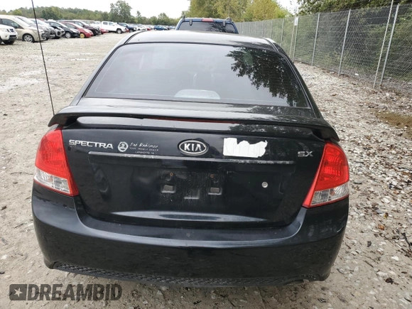 2009 Kia Spectra EX with VIN KNAFE221395026165, listed as a Copart auction lot 73715994 with 245,813 mi miles and Salvage Title. Bid and sale history available at carsss.com. Image 6.