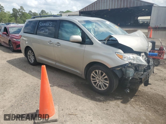 2016 Toyota Sienna XLE with VIN 5TDYK3DC0GS697468, listed as a Copart auction lot 51186795 with 128,851 mi miles and Salvage Title. Bid and sale history available at DreamBid. Image 4.