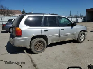 2005 GMC Envoy SLE with VIN 1GKDT13S652171203, listed as a Copart auction lot 49087815 with 292,815 mi miles and Salvage Title. Bid and sale history available at carsss.com. Image 3.