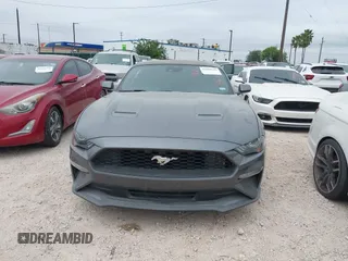 2021 Ford Mustang EcoBoost z VIN 1FA6P8TH9M5141038, wystawiony jako IAAI lot #41965588 z przebiegiem 35 344 mil mil oraz . Historia ofert i sprzedaży dostępna na DreamBid. Obrazek 12.