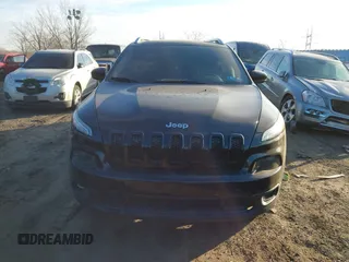 2015 Jeep Cherokee Latitude with VIN 1C4PJMCS0FW745949, listed as a IAAI auction lot 41289847 with 137,440 mi miles and . Bid and sale history available at carsss.com. Image 12.