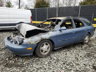 1999 Ford Taurus SE Standard with VIN 1FAFP58U5XA167037, listed as a Copart auction lot 48145015 with 0 mi miles and Salvage Title. Bid and sale history available at carsss.com. Image 1.