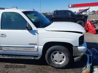 2003 GMC Yukon SLT with VIN 1GKEC13Z13J197955, listed as a IAAI auction lot 41586841 with 208,752 mi miles. Bid and sale history available at carsss.com. Image 17.