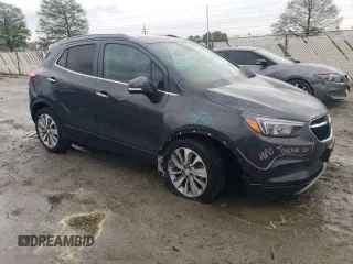 2018 Buick Encore Preferred with VIN KL4CJASBXJB669665, listed as a Copart auction lot 52557365 with 49,327 mi miles and Salvage Title. Bid and sale history available at DreamBid. Image 4.
