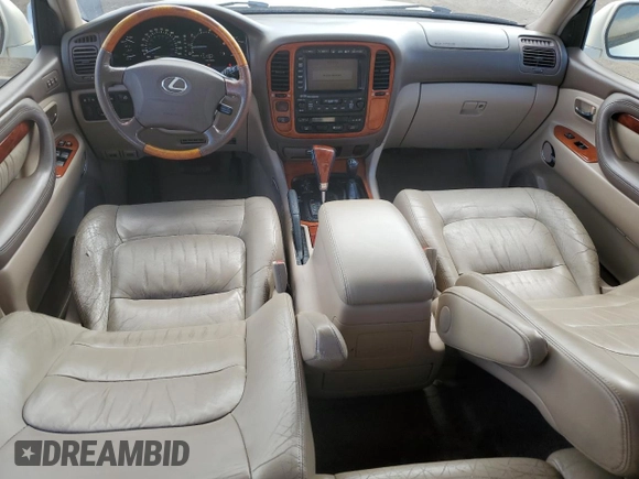 2002 Lexus LX 470 z VIN JTJHT00W423522126, wystawiony jako Copart lot #56582855 z przebiegiem 280 679 mil mil oraz Szkoda całkowita • Salvage title. Historia ofert i sprzedaży dostępna na DreamBid. Obrazek 8.