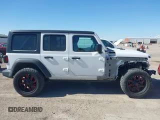 2021 Jeep Wrangler Unlimited Willys z VIN 1C4HJXDN3MW525460, wystawiony jako IAAI lot #41770265 z przebiegiem 76 480 mil mil oraz . Historia ofert i sprzedaży dostępna na DreamBid. Obrazek 14.