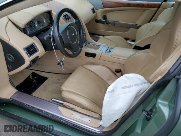 2005 Aston Martin DB9 z VIN SCFAD01A95GA02851, wystawiony jako Copart lot #63535783 z przebiegiem 40 729 mil mil oraz . Historia ofert i sprzedaży dostępna na DreamBid. Obrazek 7.