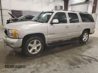 2004 GMC Yukon XL SLT z VIN 1GKFK16Z44J168891, wystawiony jako Copart lot #55572385 z przebiegiem 320 530 mil mil oraz Szkoda całkowita • Salvage title. Historia ofert i sprzedaży dostępna na DreamBid. Obrazek 1.