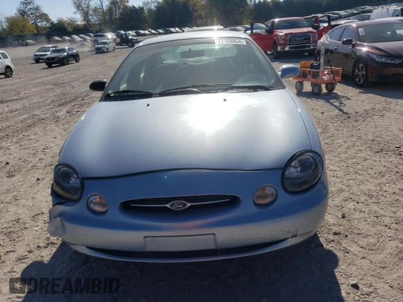 1998 Ford Taurus LX z VIN 1FAFP52U5WA273382, wystawiony jako Copart lot #77102854 z przebiegiem 73 014 mil mil oraz Szkoda całkowita • Salvage title. Historia ofert i sprzedaży dostępna na DreamBid. Obrazek 5.