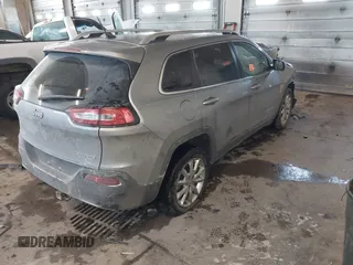 2015 Jeep Cherokee Limited with VIN 1C4PJLDB0FW505891, listed as a IAAI auction lot 41620674 with 120,804 mi miles and . Bid and sale history available at DreamBid. Image 4.