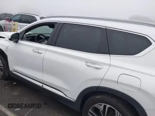 2019 Hyundai Santa Fe Ultimate with VIN 5NMS5CAA3KH036089, listed as a IAAI auction lot 40810710 with 62,561 mi miles and . Bid and sale history available at DreamBid. Image 14.