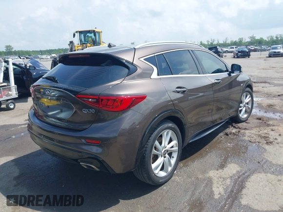 2019 Infiniti QX30 Luxe z VIN SJKCH5CP5KA012022, wystawiony jako IAAI lot #42088799 z przebiegiem 107 381 mil mil oraz . Historia ofert i sprzedaży dostępna na DreamBid. Obrazek 4.