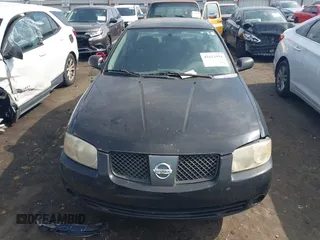 2006 Nissan Sentra S z VIN 3N1CB51D36L470317, wystawiony jako IAAI lot #42112934 z przebiegiem 303 501 mil mil oraz . Historia ofert i sprzedaży dostępna na DreamBid. Obrazek 12.