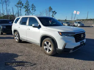 2023 Honda Pilot EX-L z VIN 5FNYG1H53PB030948, wystawiony jako IAAI lot #41298079 z przebiegiem 23 262 mil mil oraz . Historia ofert i sprzedaży dostępna na DreamBid. Obrazek 1.