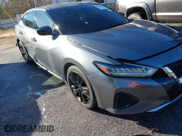 2020 Nissan Maxima S with VIN 1N4AA6BV7LC381254, listed as a IAAI auction lot 41246789 with 73,562 mi miles and . Bid and sale history available at DreamBid. Image 1.