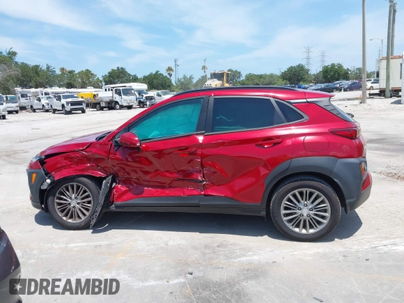 2021 Hyundai Kona SEL with VIN KM8K22AA8MU601480, listed as a IAAI auction lot 39589701 with 55,876 mi miles and . Bid and sale history available at carsss.com. Image 14.