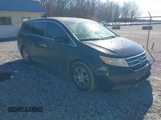 2012 Honda Odyssey EX-L with VIN 5FNRL5H69CB017227, listed as a IAAI auction lot 41345254 with 136,775 mi miles and . Bid and sale history available at carsss.com. Image 1.