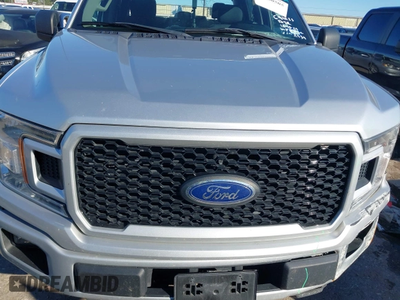 2019 Ford F-150 XL with VIN 1FTEW1CP6KFD42734, listed as a IAAI auction lot 41260505 with 101,702 mi miles and . Bid and sale history available at carsss.com. Image 12.