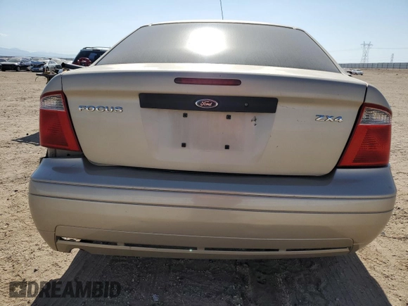 2006 Ford Focus S с VIN 1FAFP34N86W242740, выставлен на аукционе Copart как лот 59131295 с пробегом 119 127 миль миль и Списание • Salvage title. История ставок и продаж доступна на DreamBid. Изображение 6.