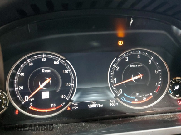 2015 BMW 7 Series 750Li xDrive z VIN WBAYF8C57FD653916, wystawiony jako Copart lot #52864275 z przebiegiem 138 811 mil mil oraz Szkoda całkowita • Salvage title. Historia ofert i sprzedaży dostępna na DreamBid. Obrazek 9.