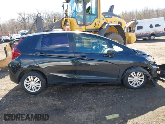2015 Honda Fit LX z VIN 3HGGK5H51FM775176, wystawiony jako IAAI lot #41690648 z przebiegiem 49 979 mil mil oraz . Historia ofert i sprzedaży dostępna na DreamBid. Obrazek 13.