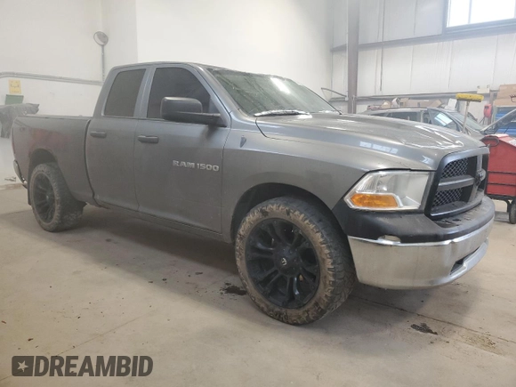 2012 Ram 1500 ST with VIN 1C6RD7FP7CS111086, listed as a Copart auction lot 56385285 with 459,974 mi miles and Salvage title. Bid and sale history available at DreamBid. Image 4.
