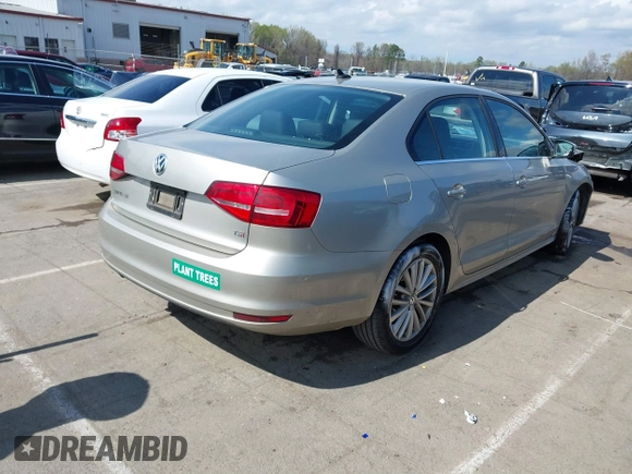 2015 Volkswagen Jetta Sedan 1.8T SE w/Connectivity with VIN 3VWD07AJ6FM229576, listed as a IAAI auction lot 41879446 with 89,792 mi miles. Bid and sale history available at carsss.com. Image 4.
