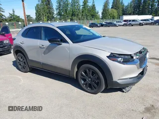 2024 Mazda CX-30 S Select Sport z VIN 3MVDMBBM2RM647154, wystawiony jako IAAI lot #42354533 z przebiegiem 31 181 mil mil oraz . Historia ofert i sprzedaży dostępna na DreamBid. Obrazek 1.