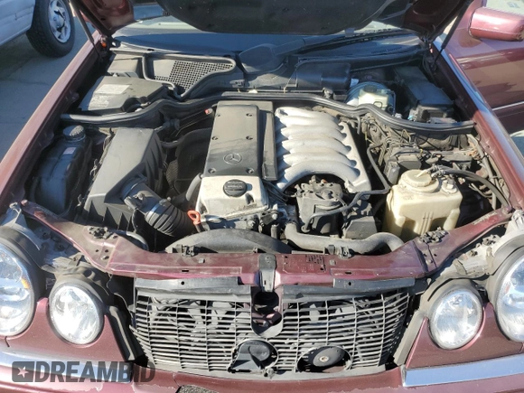 1998 Mercedes-Benz E 320 with VIN WDBJF25FXWA549962, listed as a Copart auction lot 87876005 with 303,884 mi miles and Salvage Title. Bid and sale history available at DreamBid. Image 11.