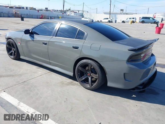 2019 Dodge Charger Scat Pack with VIN 2C3CDXGJ4KH576394, listed as a IAAI auction lot 41846702 with 70,209 mi miles and . Bid and sale history available at DreamBid. Image 3.