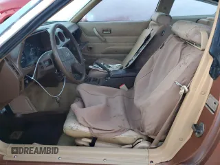 1981 Datsun 280ZX z VIN JN1HZ04SXBX259192, wystawiony jako Copart lot #77847764 z przebiegiem 91 619 mil mil oraz Szkody całkowita. Historia ofert i sprzedaży dostępna na DreamBid. Obrazek 7.