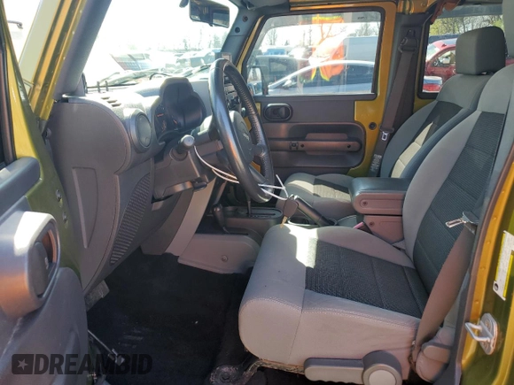 2008 Jeep Wrangler Unlimited X with VIN 1J4GA39118L528479, listed as a Copart auction lot 50953825 with 171,156 mi miles and Salvage Title. Bid and sale history available at carsss.com. Image 7.