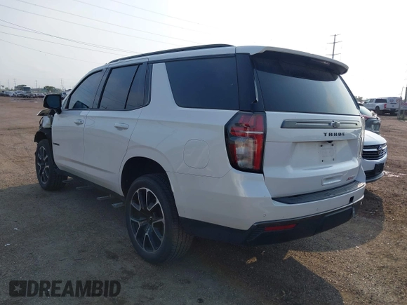 2022 Chevrolet Tahoe RST with VIN 1GNSCRKDXNR127062, listed as a IAAI auction lot 42377837 with 25,785 mi miles and . Bid and sale history available at DreamBid. Image 3.