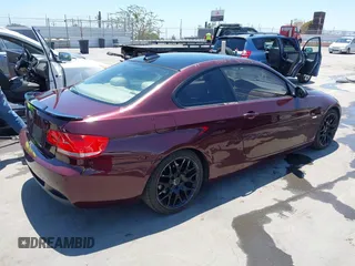 2007 BMW 3 Series 328i with VIN WBAWV13557P118052, listed as a IAAI auction lot 42642784 with 57,288 mi miles and . Bid and sale history available at DreamBid. Image 4.
