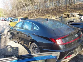 2022 Hyundai Sonata Hybrid Blue with VIN KMHL24JJ5NA041548, listed as a IAAI auction lot 41984039 with 29,281 mi miles. Bid and sale history available at carsss.com. Image 3.