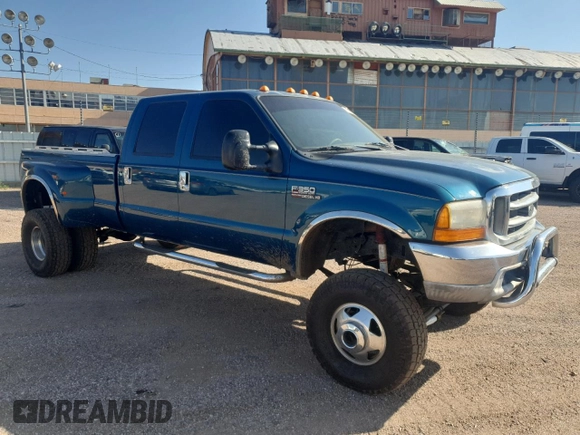 2000 Ford F-350 XL z VIN 1FTWW33F1YED10988, wystawiony jako Copart lot #60320125 z przebiegiem 185 381 mil mil oraz Czysty tytuł • Clean title. Historia ofert i sprzedaży dostępna na DreamBid. Obrazek 4.