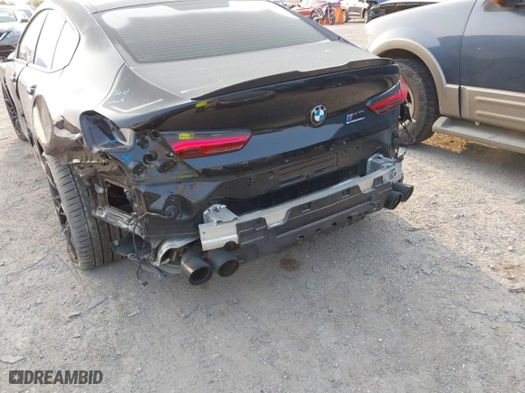 2020 BMW M8 with VIN WBSGV0C06LCD99264, listed as a IAAI auction lot 40276722 with 38,039 mi miles. Bid and sale history available at carsss.com. Image 6.