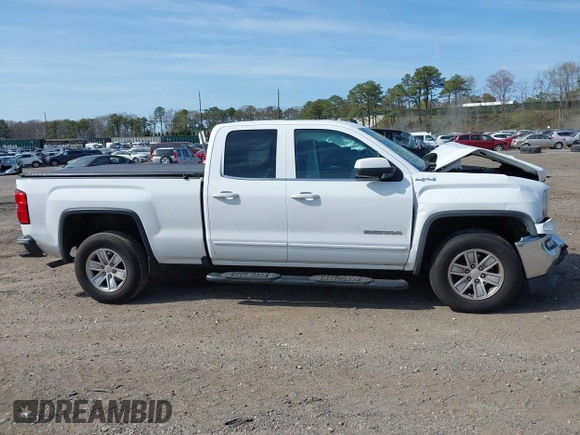 2017 GMC Sierra 1500 SLE z VIN 1GTV2MEC0HZ291794, wystawiony jako IAAI lot #42055172 z przebiegiem 235 969 mil mil oraz . Historia ofert i sprzedaży dostępna na DreamBid. Obrazek 13.