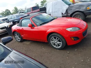 2011 Mazda MX-5 Miata Sport z VIN JM1NC2JF7B0218824, wystawiony jako IAAI lot #42675310 z przebiegiem 137 493 mil mil oraz . Historia ofert i sprzedaży dostępna na DreamBid. Obrazek 13.