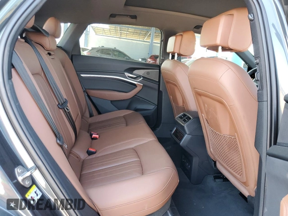 2023 Audi e-tron Premium with VIN WA1AAAGE3PB023323, listed as a Copart auction lot 69809524 with 31,564 mi miles and Salvage Title. Bid and sale history available at DreamBid. Image 11.