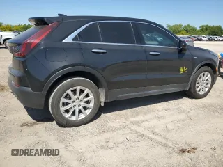 2023 Cadillac XT4 FWD Luxury z VIN 1GYAZAR46PF178003, wystawiony jako Copart lot #52024665 z przebiegiem 42 000 mil mil oraz Szkoda całkowita • Salvage title. Historia ofert i sprzedaży dostępna na DreamBid. Obrazek 3.