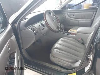 2003 Toyota Avalon XL z VIN 4T1BF28B33U291465, wystawiony jako IAAI lot #42482001 z przebiegiem 203 028 mil mil oraz . Historia ofert i sprzedaży dostępna na DreamBid. Obrazek 5.